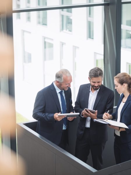 businesspeople-having-discussion-office-scaled.jpg
